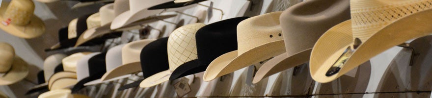 photo of row of hats for sale at rodeo