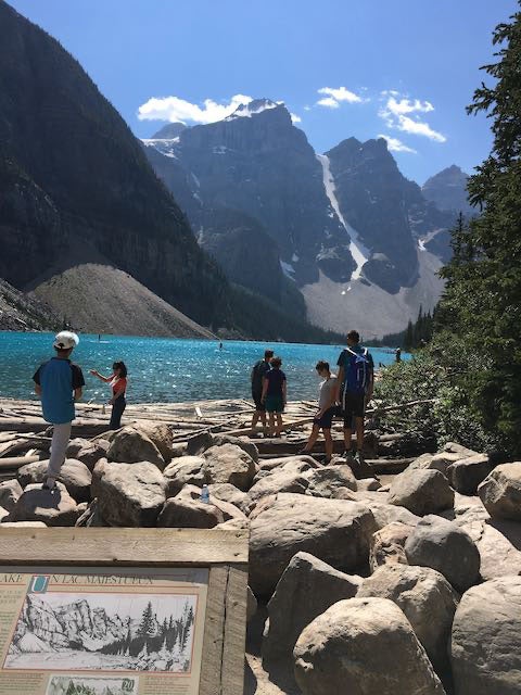Canada lake with travel sign