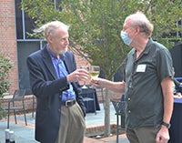 ARRUF Director Bart Sinclair congratulates newly retired Scott Cutler