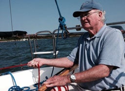 Sandy Havens on his boat near the coast of Martha's Vineyard, MA